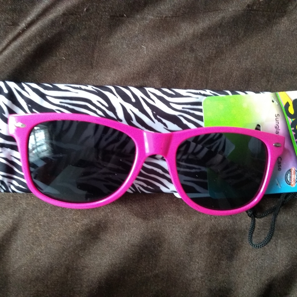 Girls Surge Sunglasses with case by Foster Grant.